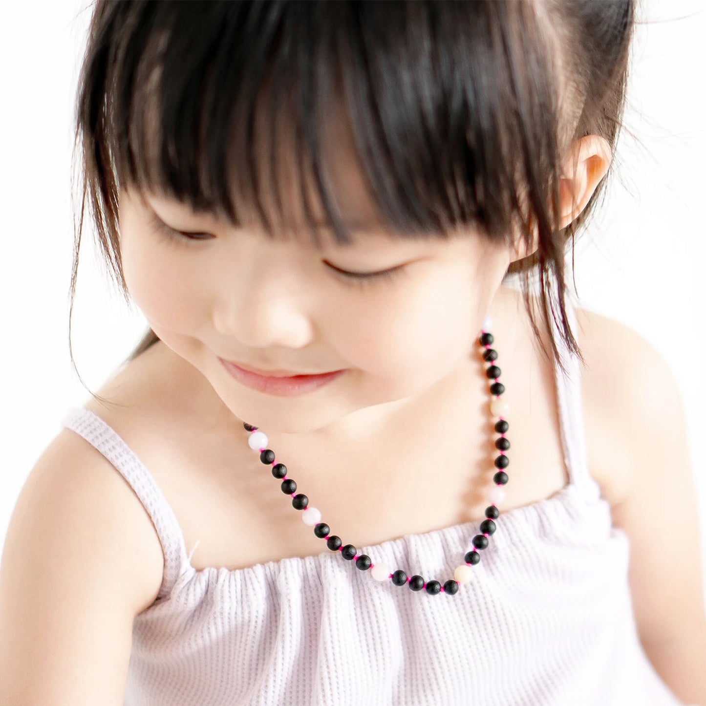 KALUNG AMBER DENGAN MORGANITE UNTUK JUNIOR. JN86