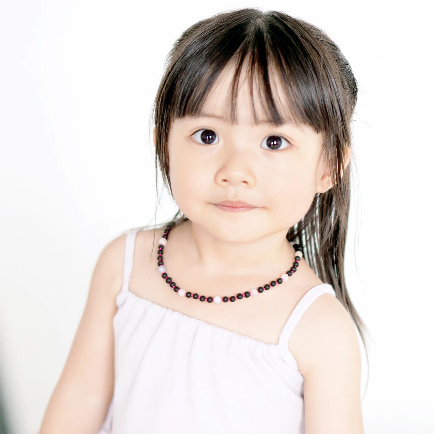 KALUNG AMBER DENGAN MORGANITE UNTUK JUNIOR. JN86