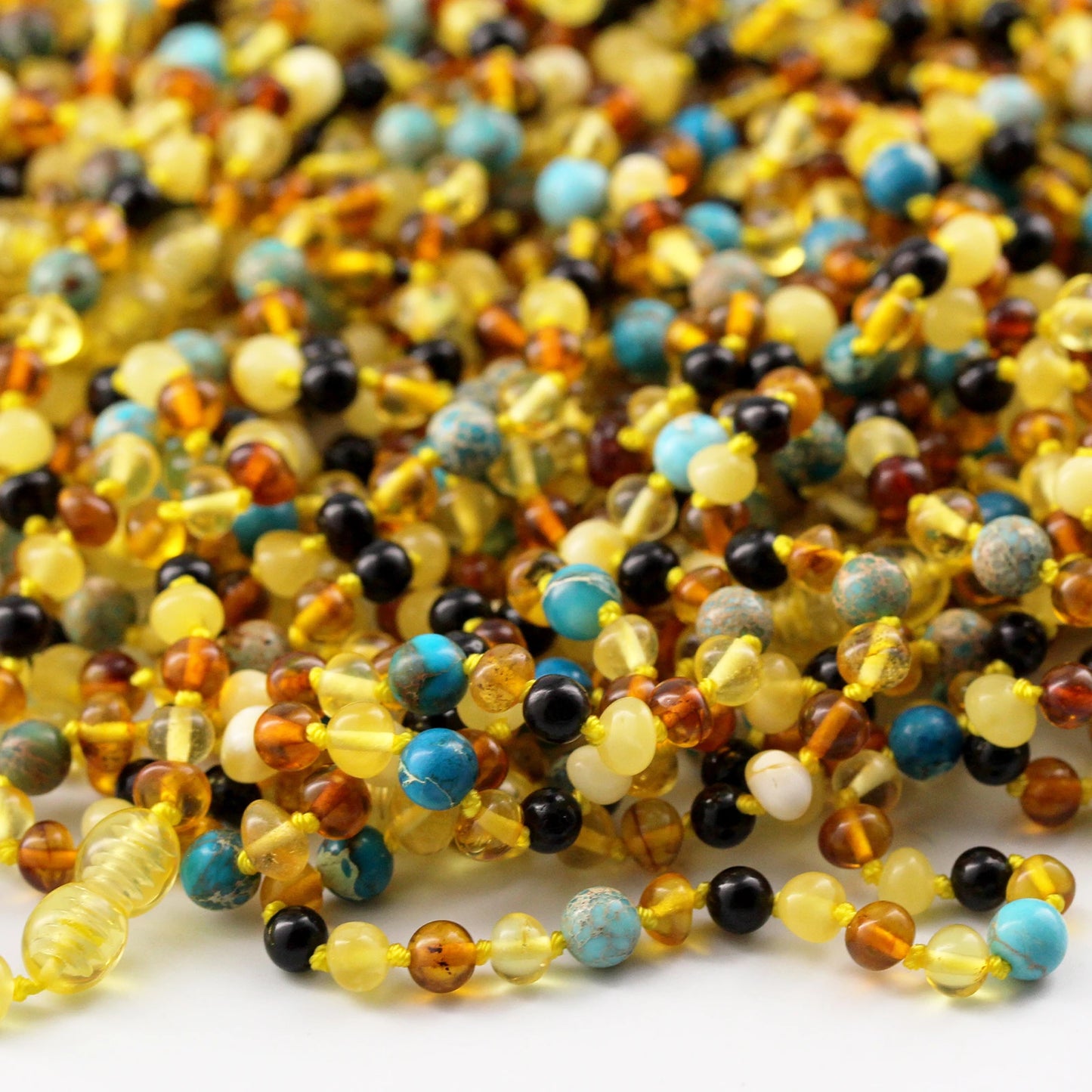 KALUNG AMBER DENGAN LAKE BLUE IMPERIAL JASPER UNTUK JUNIOR. JN96
