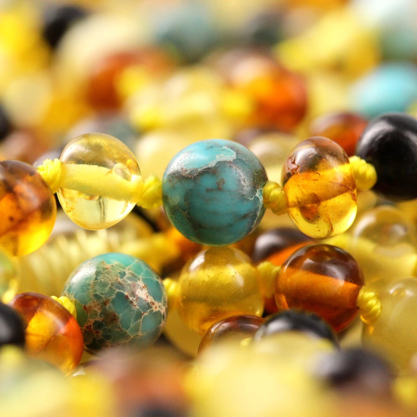 KALUNG AMBER DENGAN LAKE BLUE IMPERIAL JASPER UNTUK JUNIOR. JN96