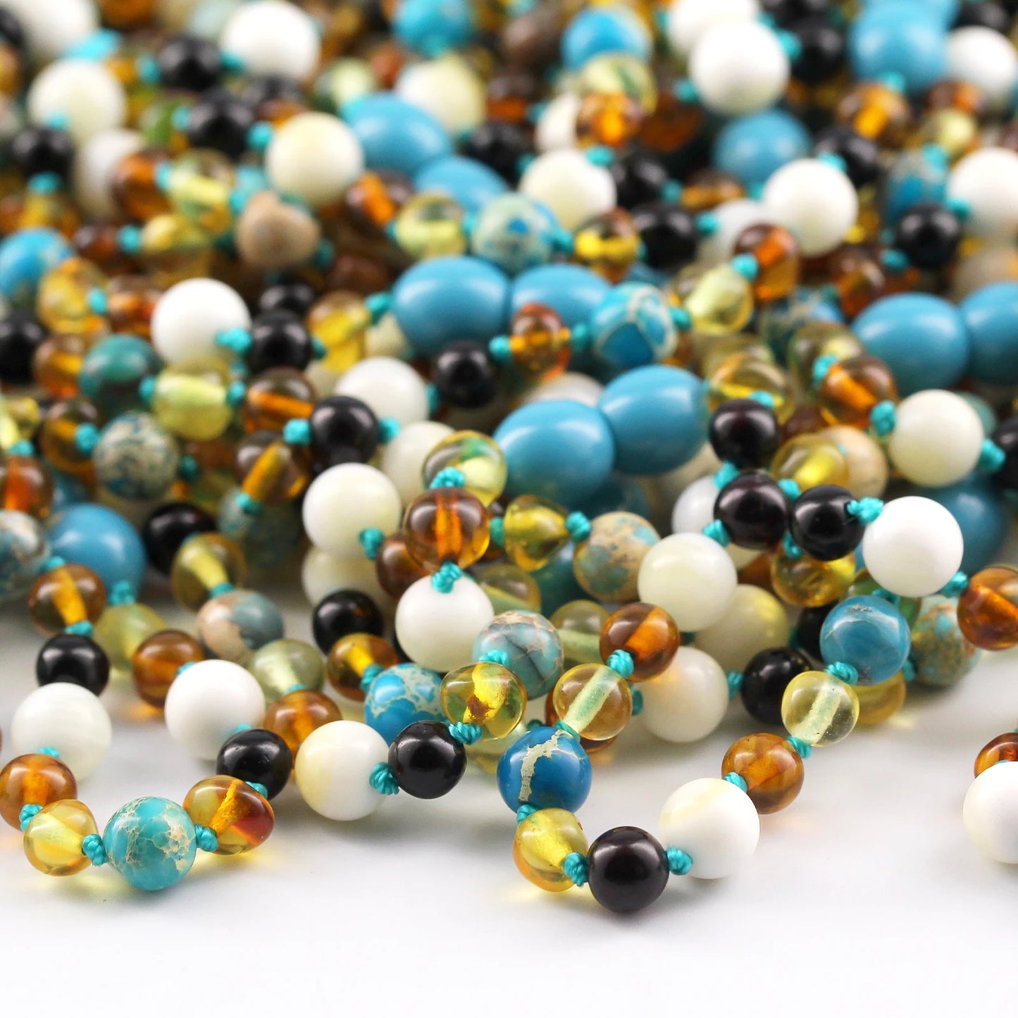 KALUNG AMBER DENGAN LAKE BLUE IMPERIAL JASPER UNTUK JUNIOR. JN96-T