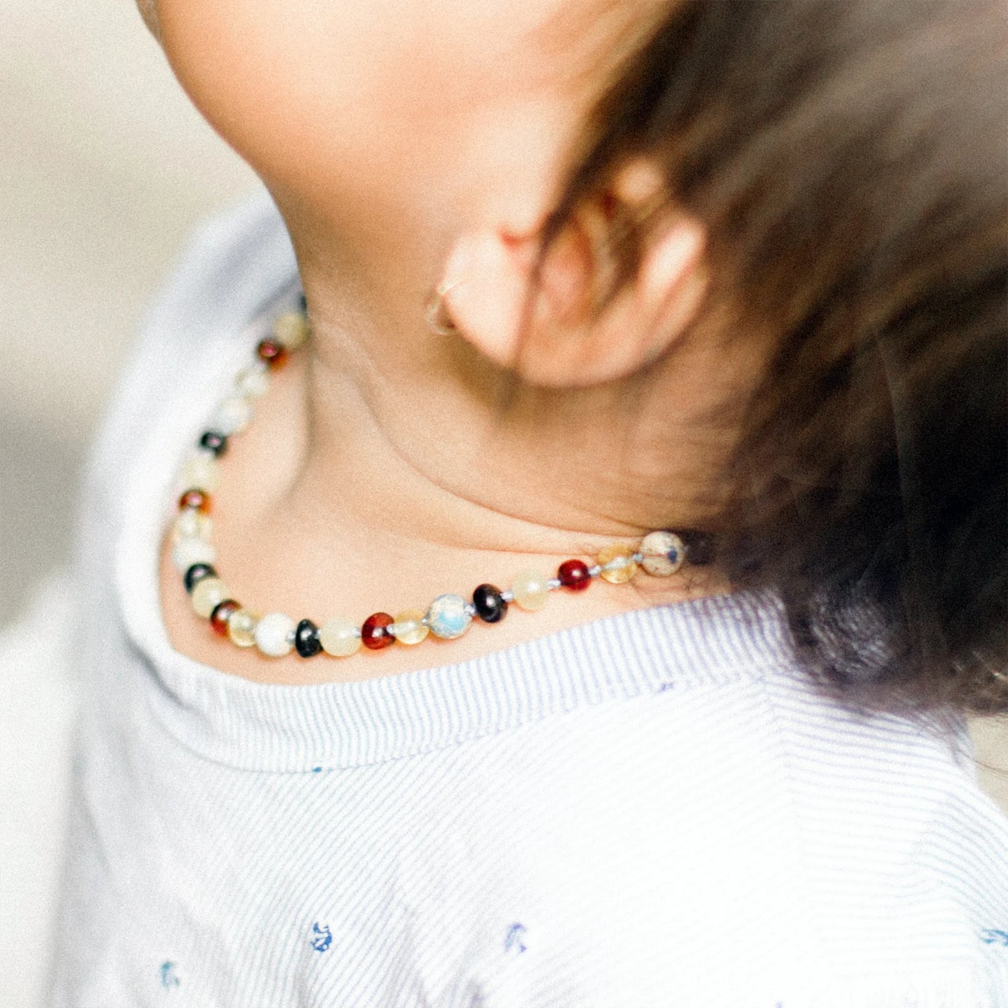 KALUNG BAYI AMBER DENGAN SKY BLUE IMPERIAL JASPER. LE466