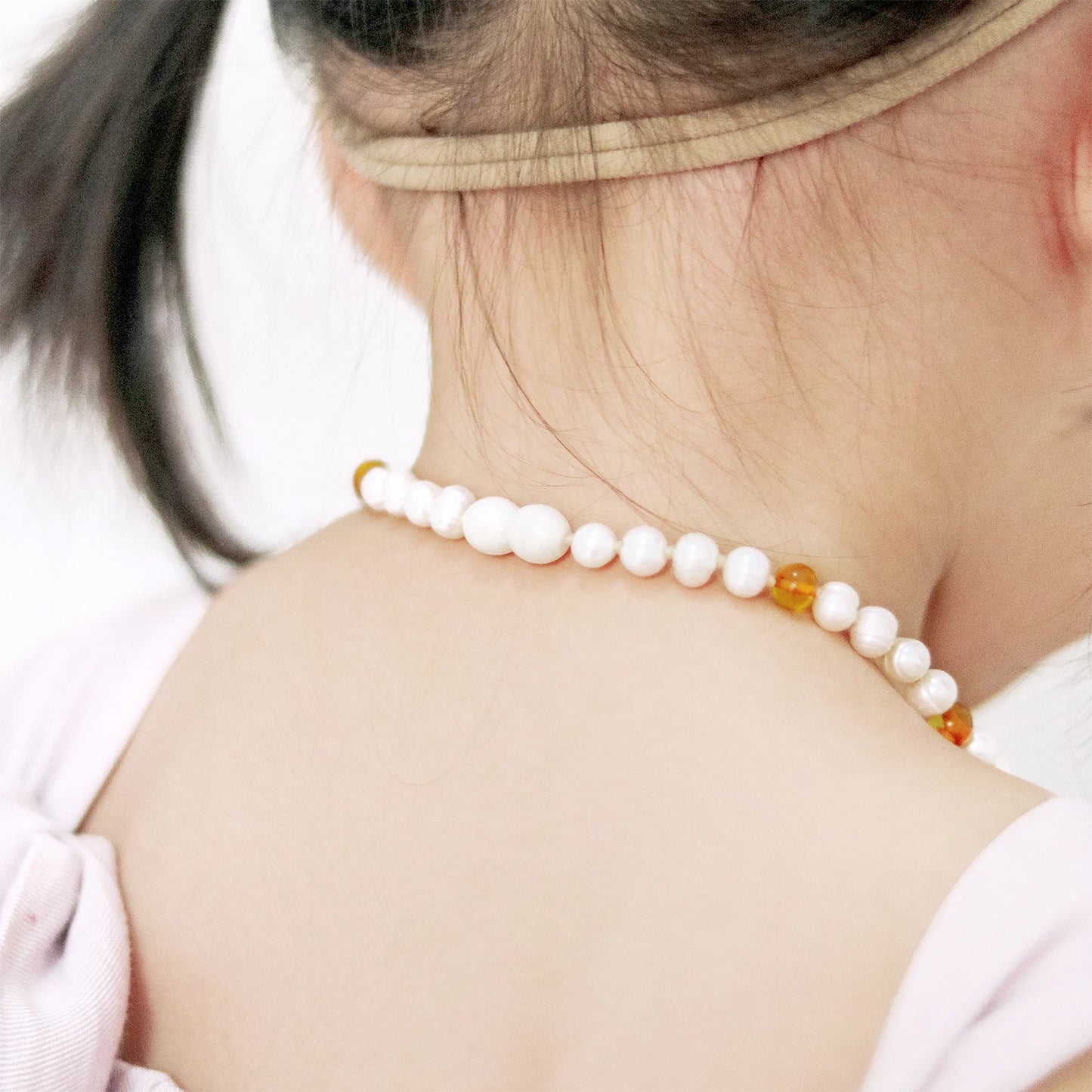 KALUNG BAYI MUTIARA DENGAN BALTIC AMBER. P2