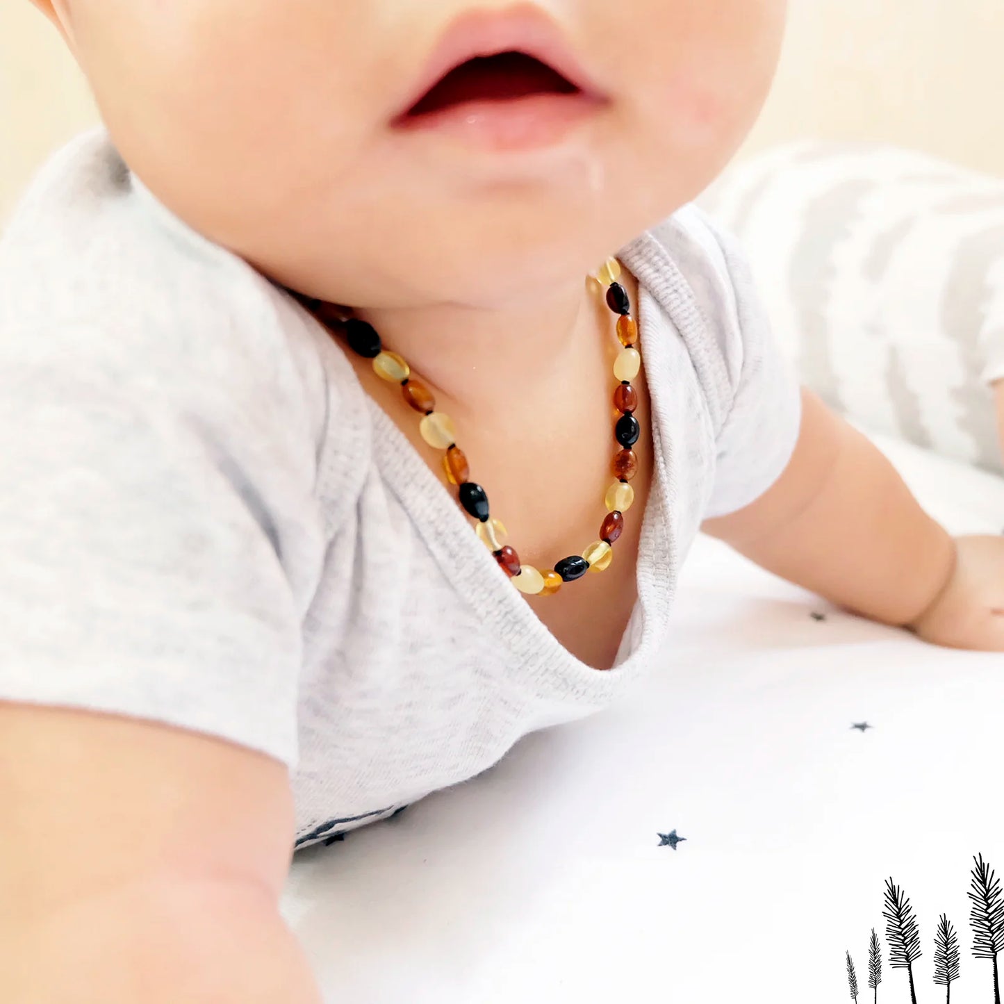 KALUNG AMBER UNTUK BAYI TUMBUH GIGI XO54M2