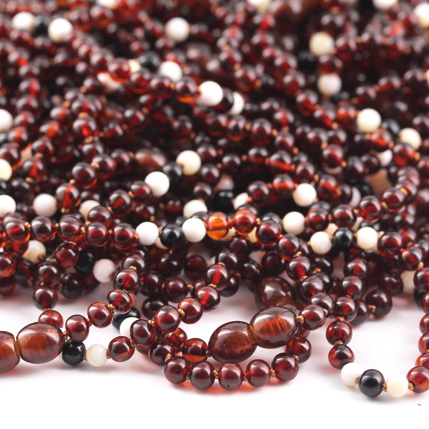 KALUNG BAYI AMBER DENGAN TRIDACNA SHELL. XLE3 V2