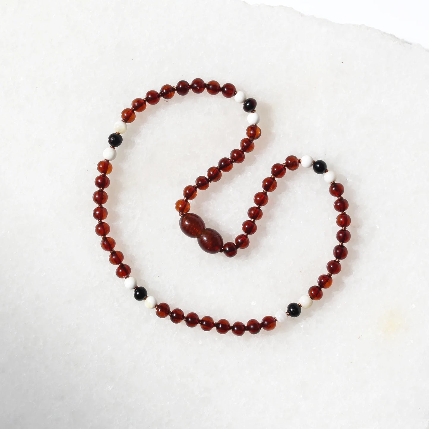 KALUNG BAYI AMBER DENGAN TRIDACNA SHELL. XLE3 V2