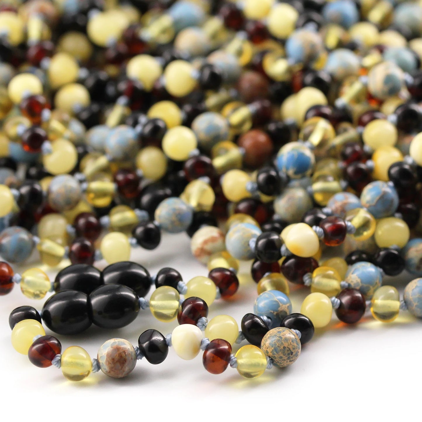 KALUNG BAYI AMBER DENGAN SKY BLUE IMPERIAL JASPER. LE466