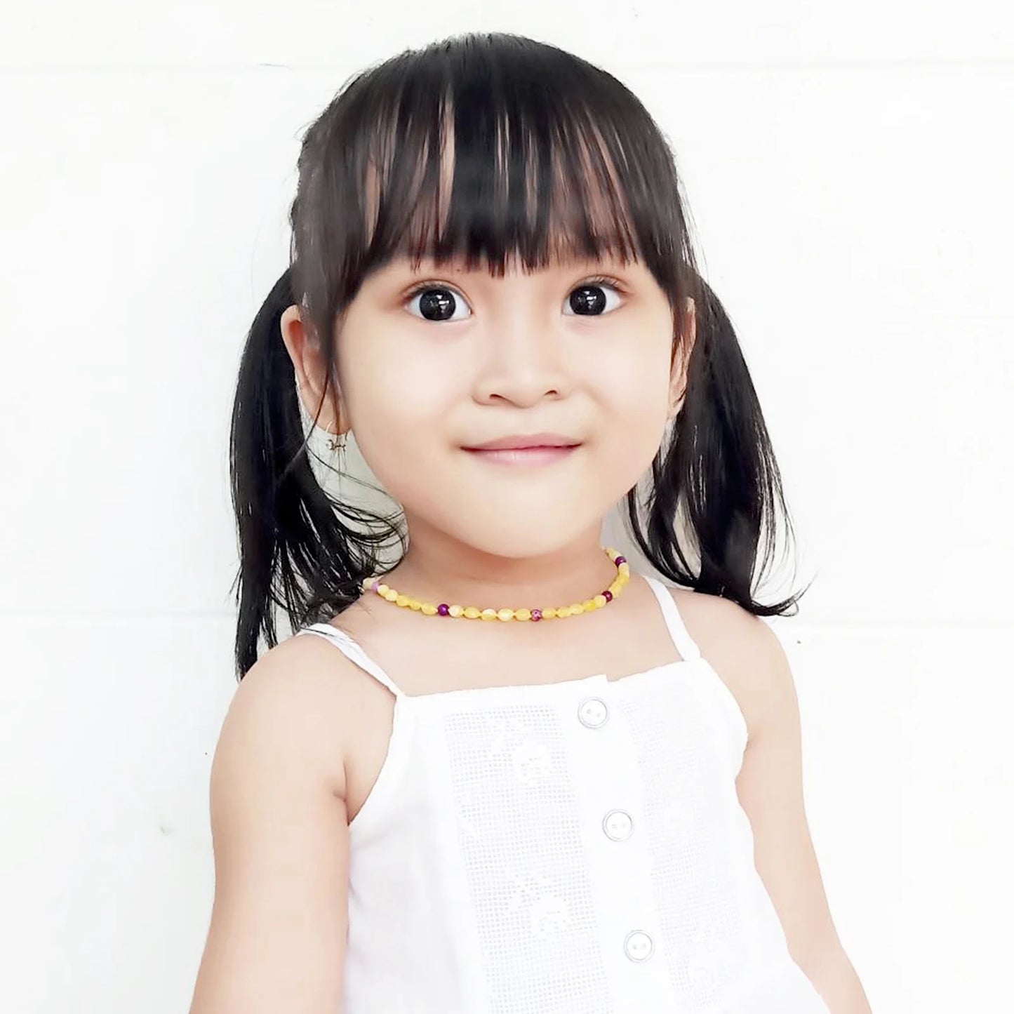 KALUNG BAYI AMBER DENGAN PURPLE IMPERIAL JASPER. LE479