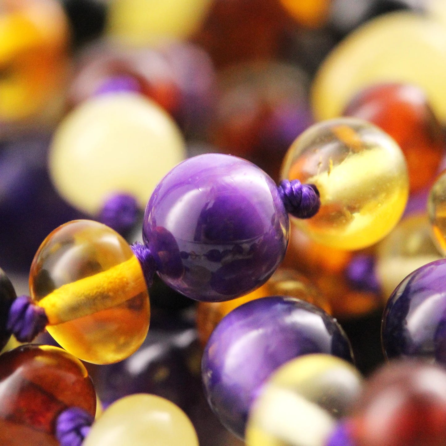 GELANG BAYI AMBER DENGAN PURPLE TIGER EYE. LE554