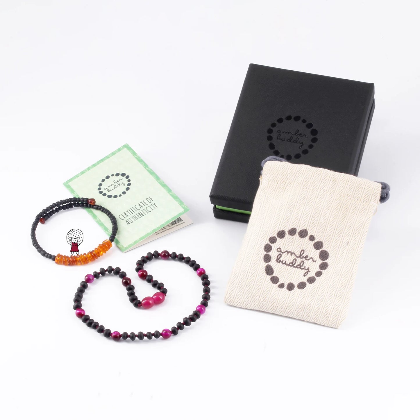 KALUNG BAYI AMBER DENGAN MAGENTA TIGER EYE. LE571