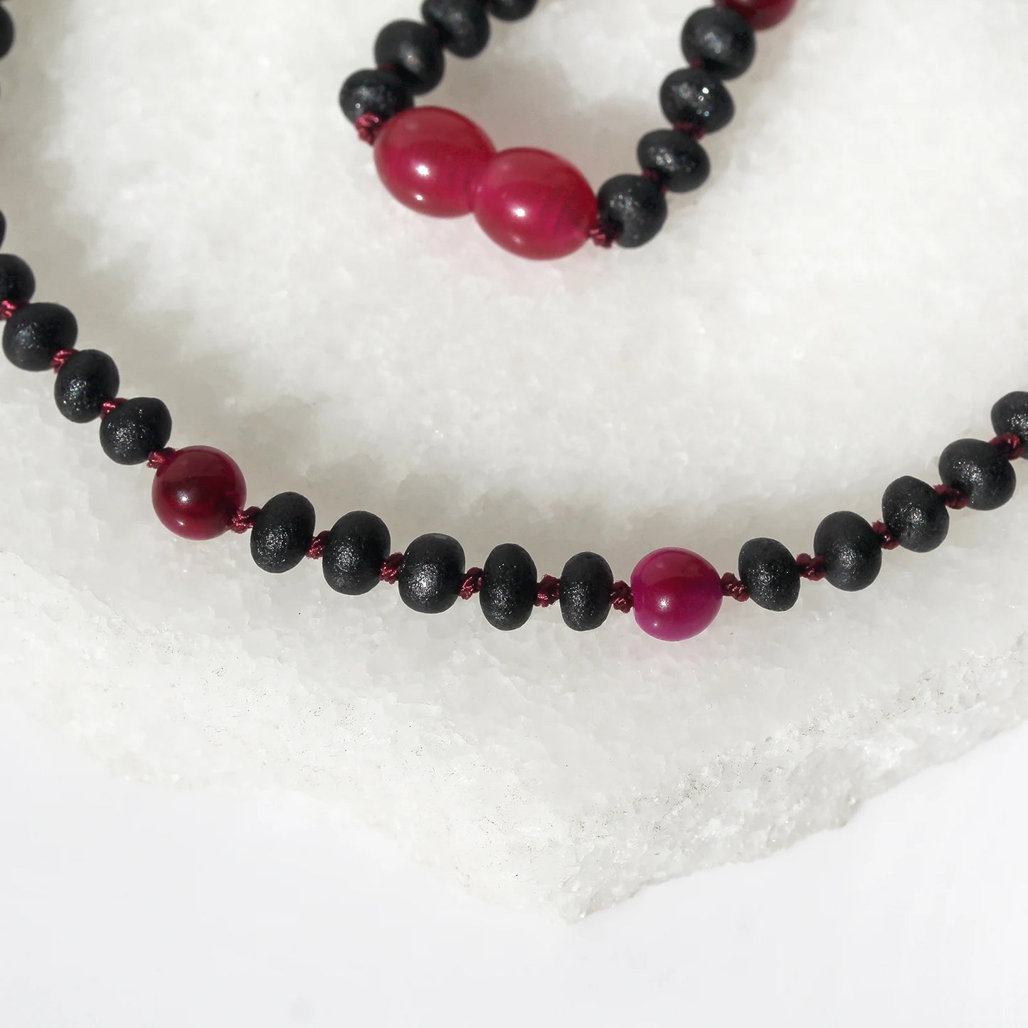 KALUNG BAYI AMBER DENGAN MAGENTA TIGER EYE. LE571