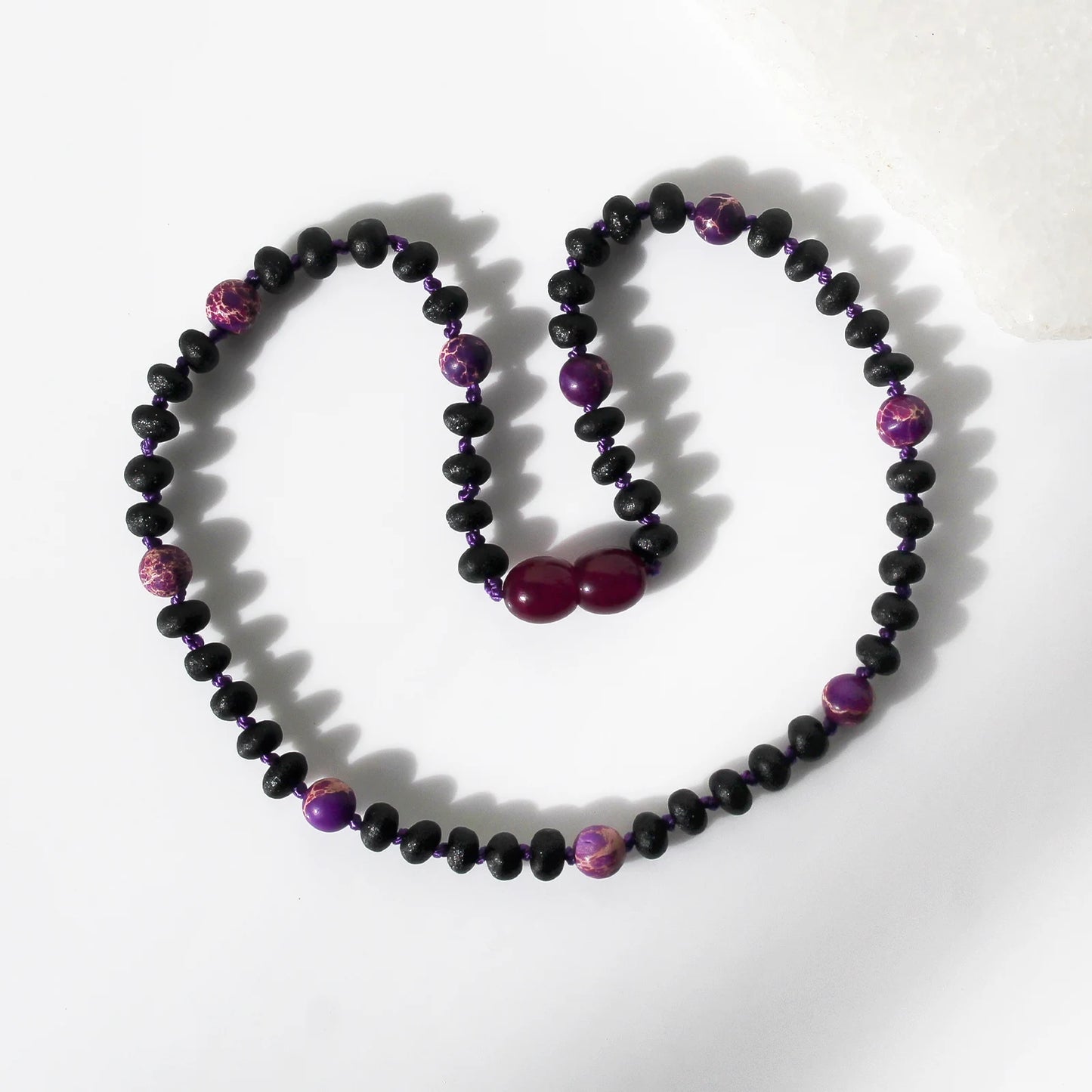 KALUNG BAYI AMBER DENGAN PURPLE IMPERIAL JASPER. LE573