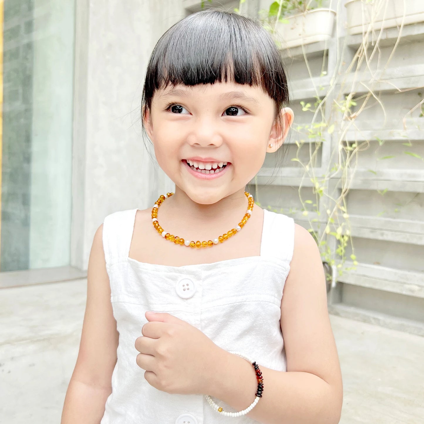 KALUNG AMBER DENGAN WHITE PEARL UNTUK JUNIOR. P1