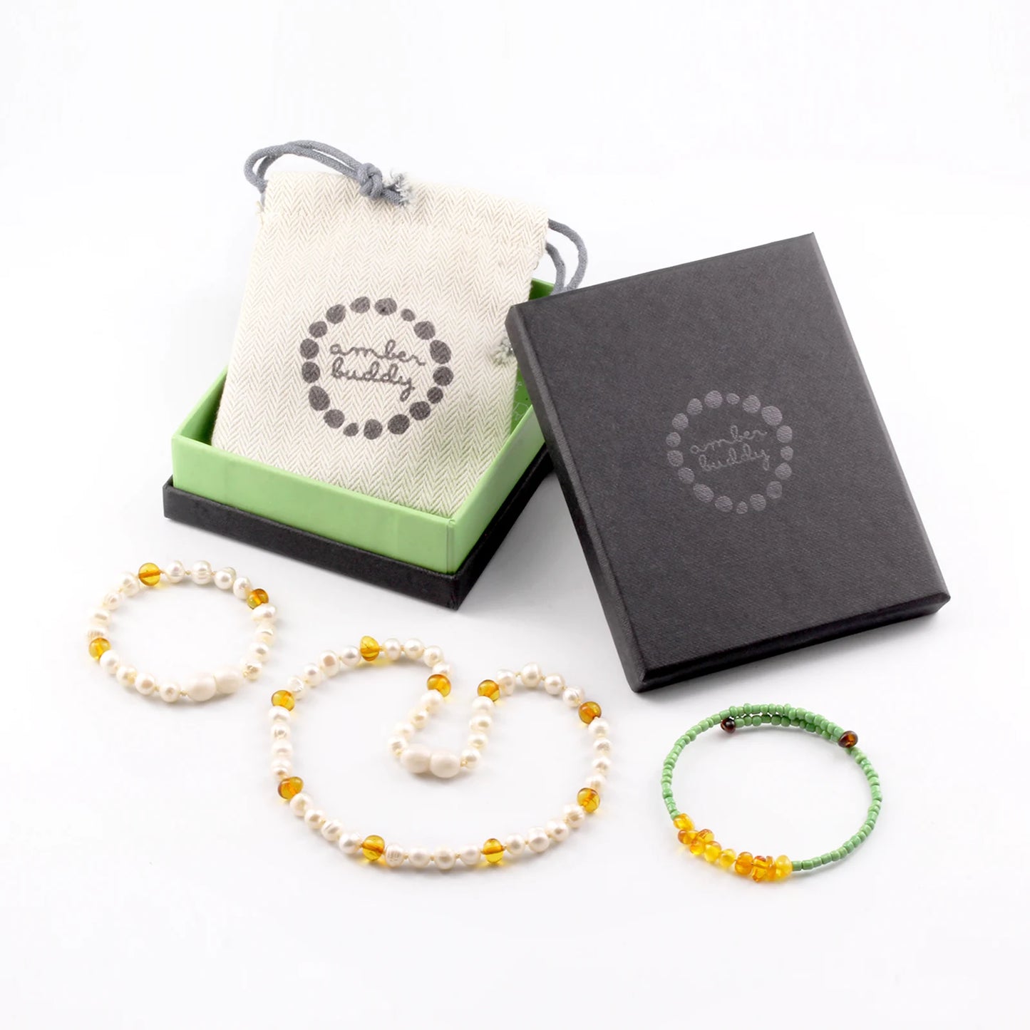 SET BAYI MUTIARA DENGAN BALTIC AMBER. P2