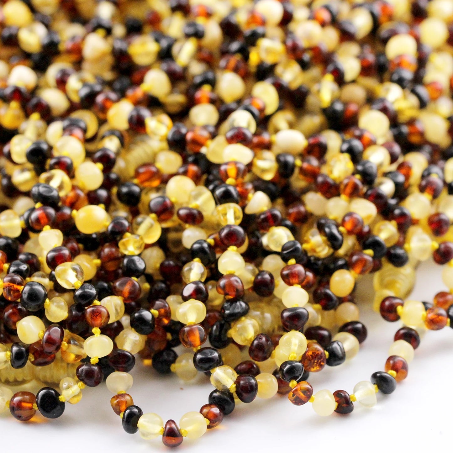 KALUNG AMBER BAYI MULTICOLOUR GLOSSY 32CM. 4X3MM
