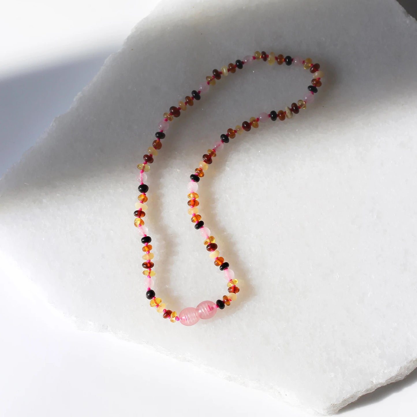 KALUNG BAYI AMBER DENGAN ROSE QUARTZ. XR42M-RQ