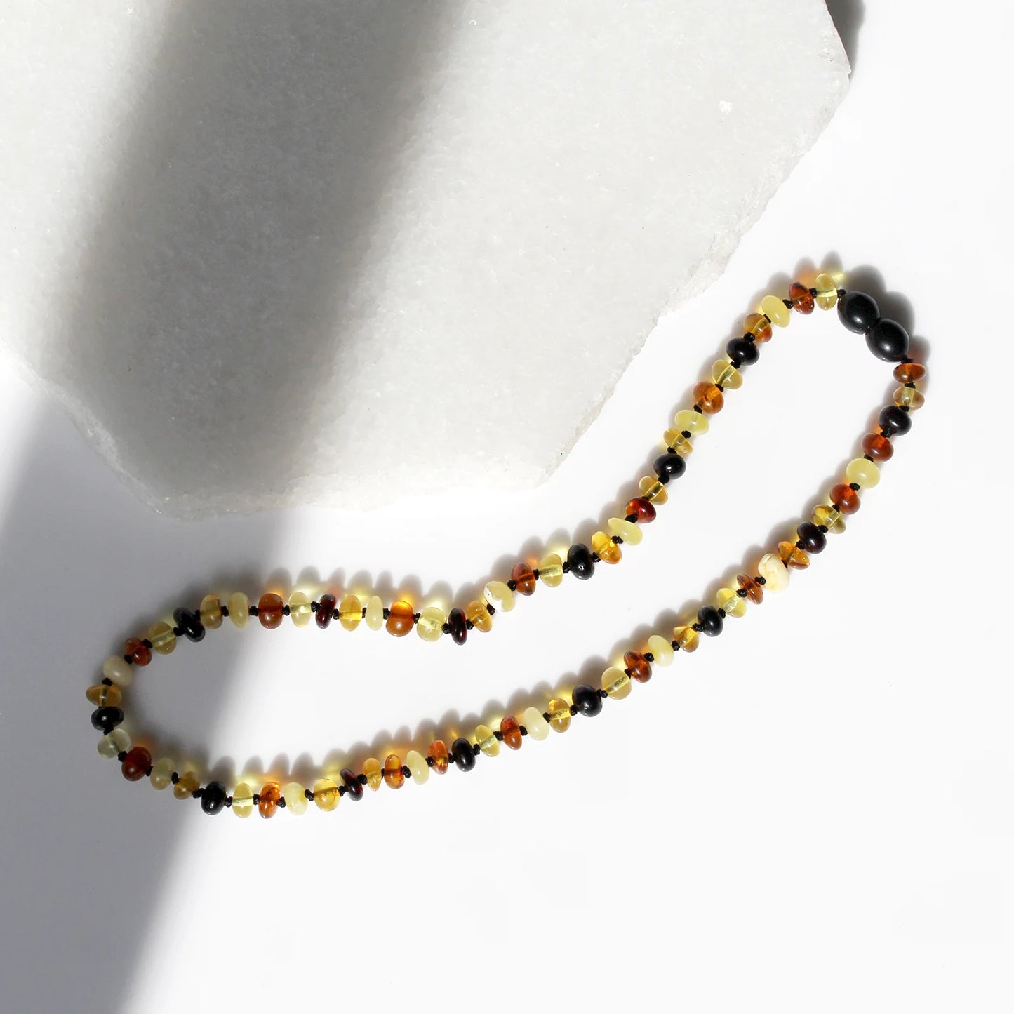 KALUNG AMBER UNTUK BAYI TUMBUH GIGI XR63M2