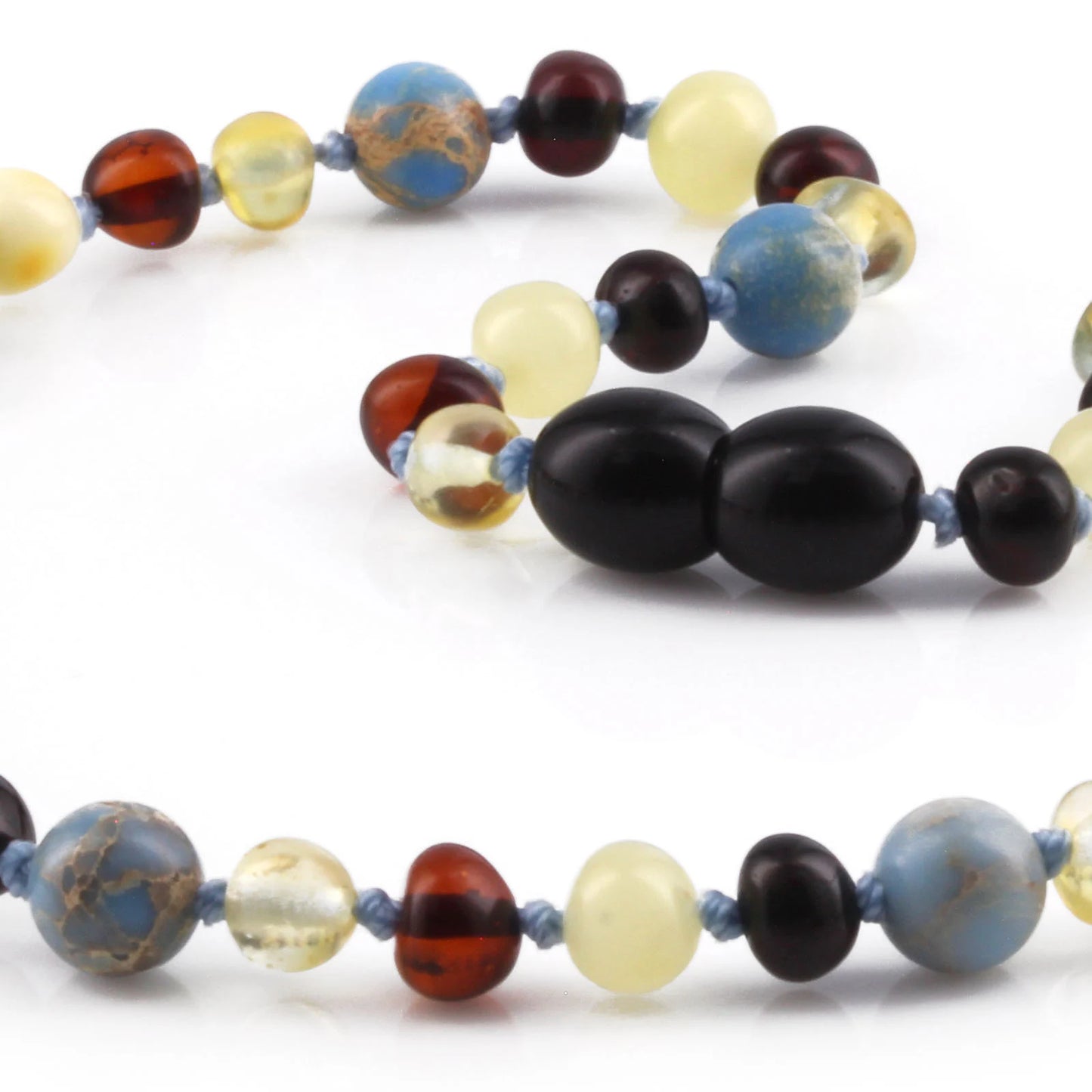KALUNG BAYI AMBER DENGAN SKY BLUE IMPERIAL JASPER. LE466