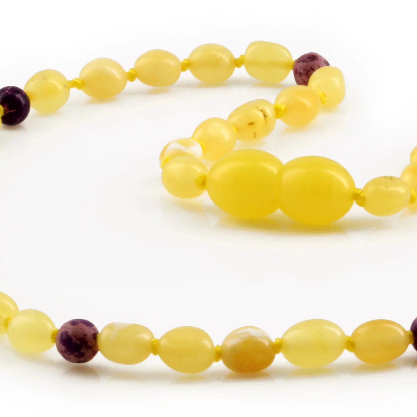 KALUNG BAYI AMBER DENGAN PURPLE IMPERIAL JASPER. LE479