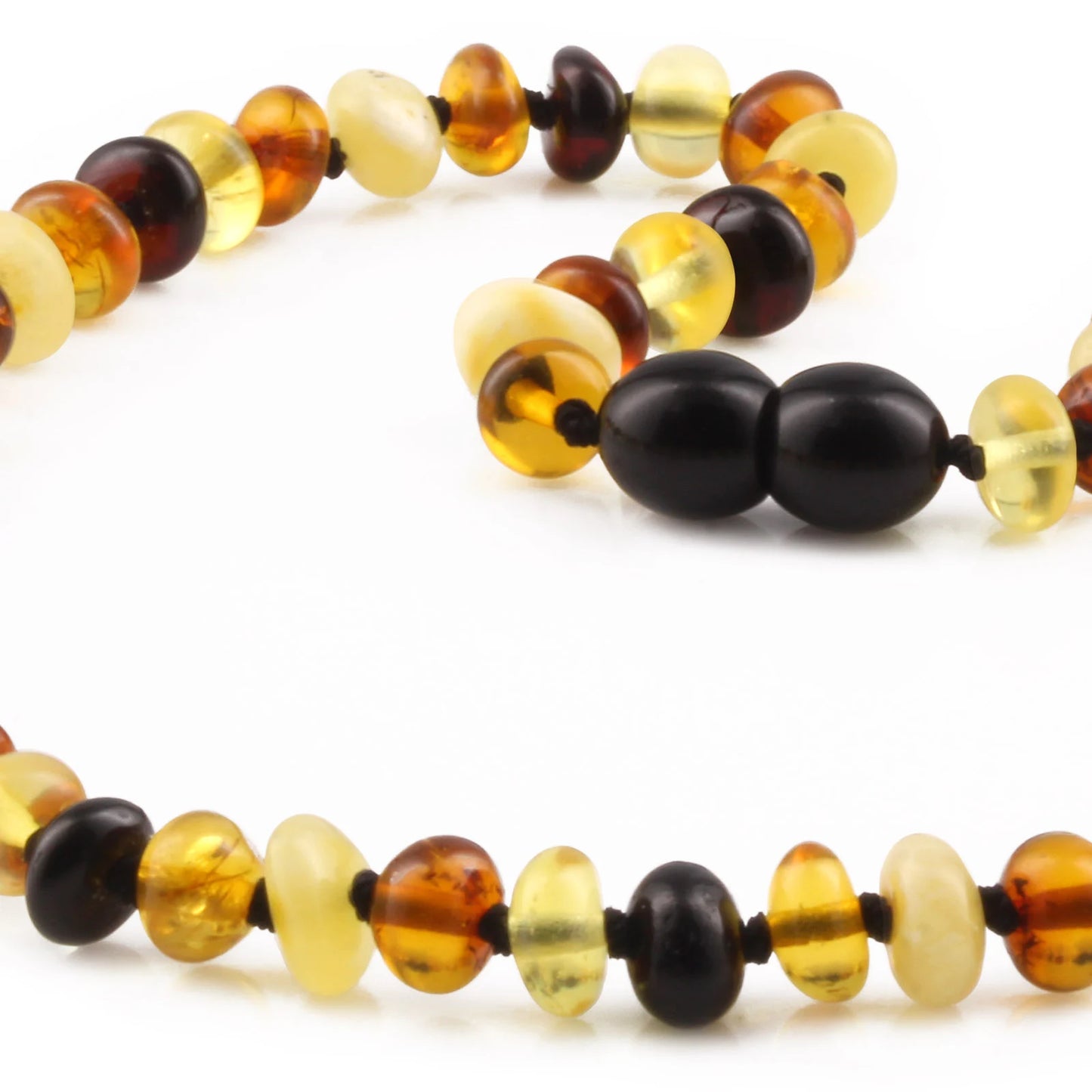 KALUNG AMBER UNTUK BAYI TUMBUH GIGI XR63M2