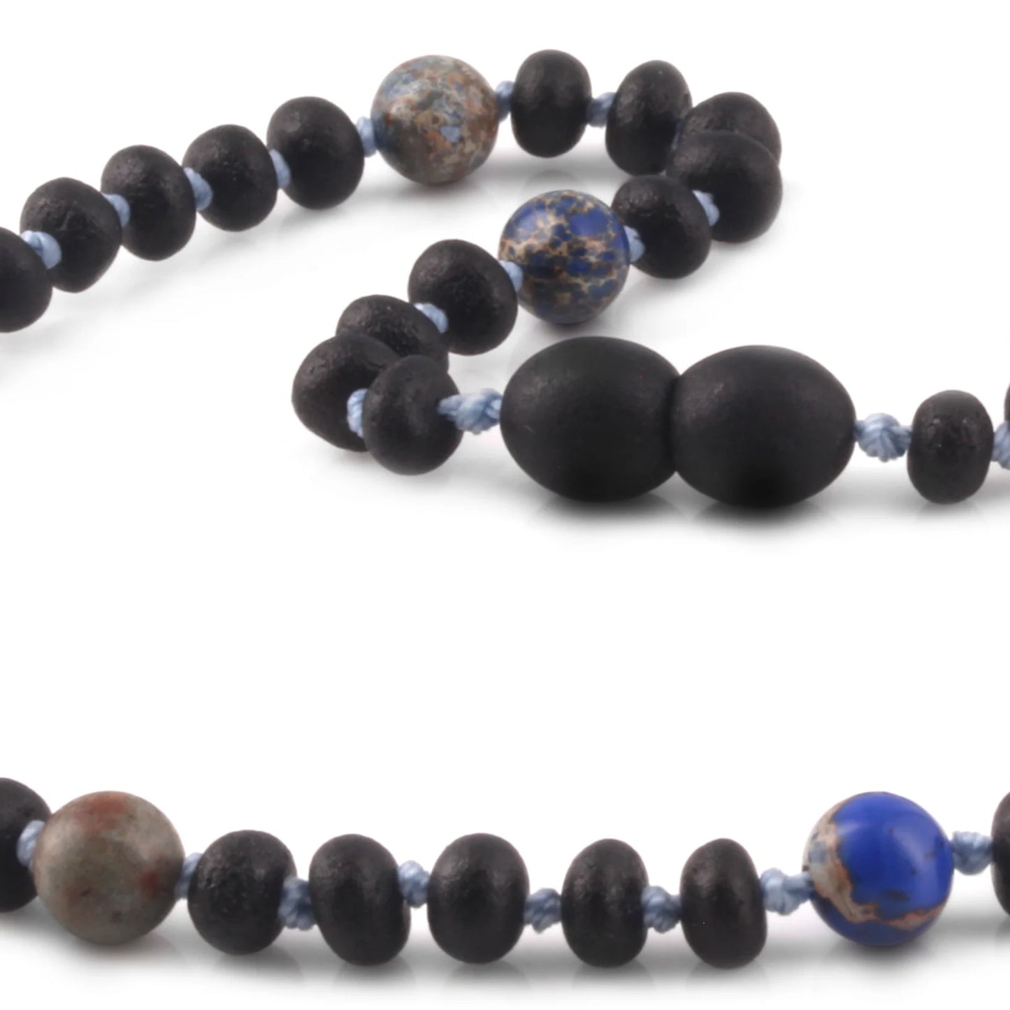 KALUNG BAYI AMBER DENGAN DEEP BLUE IMPERIAL JASPER. LE572