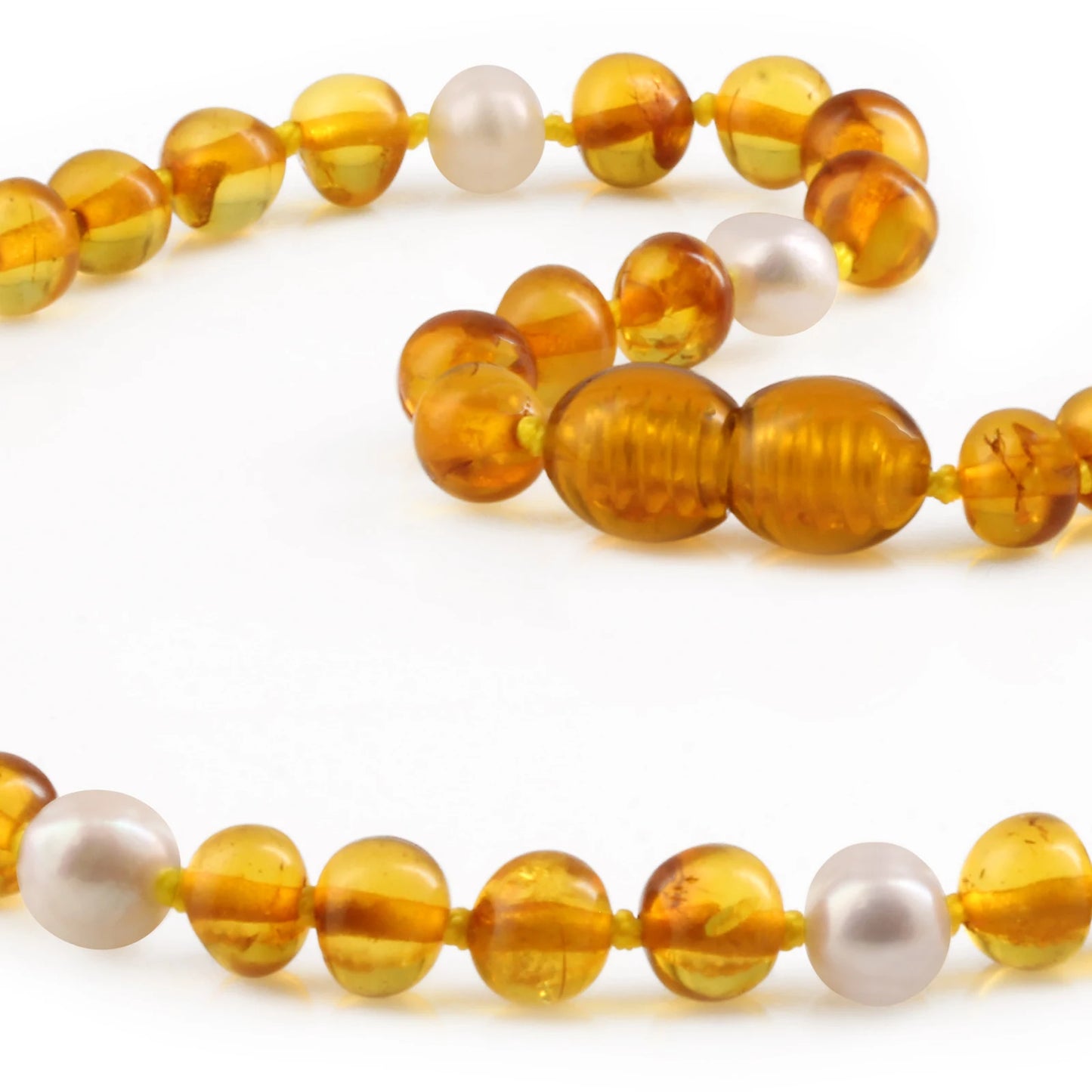 KALUNG BAYI AMBER DENGAN WHITE PEARL. P1
