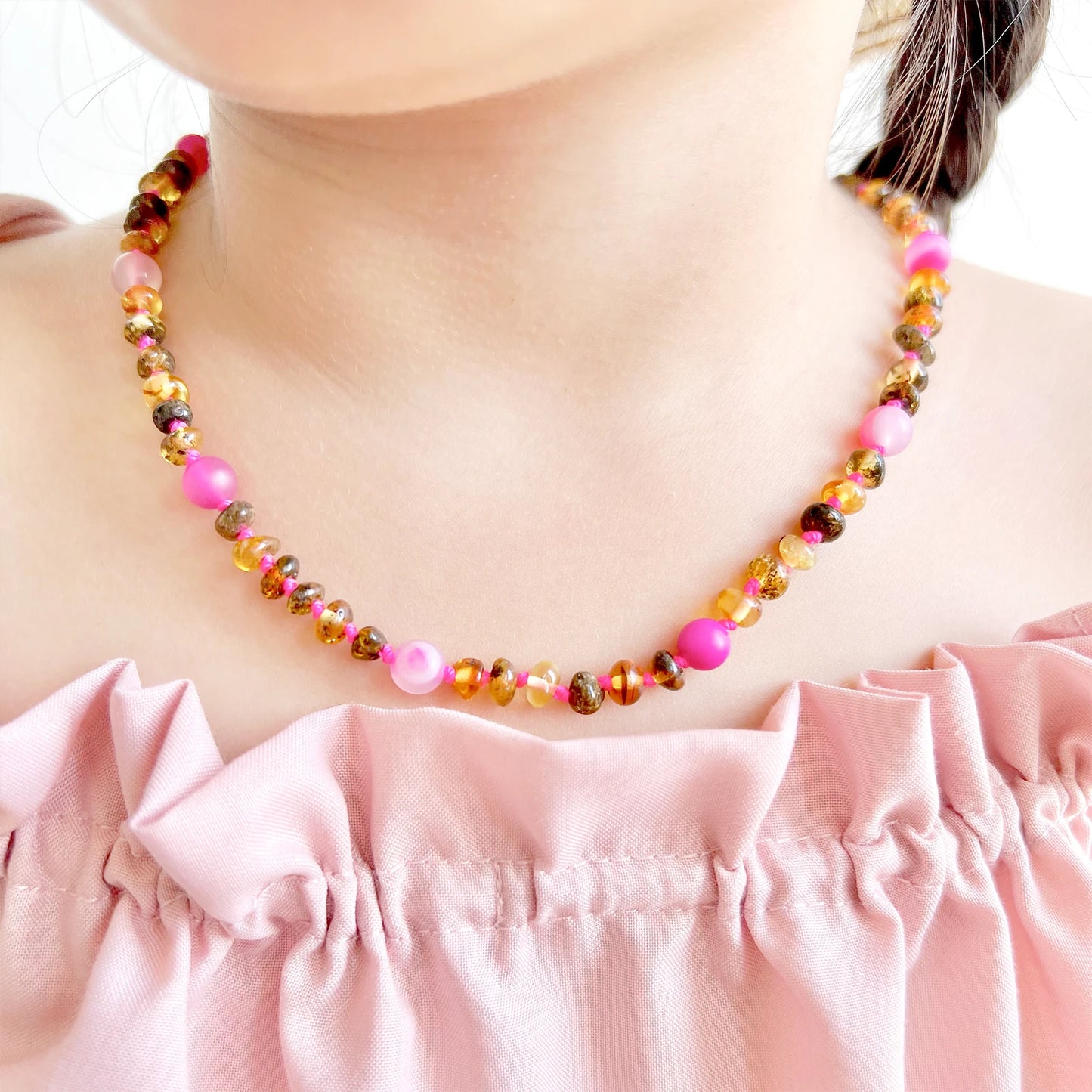 KALUNG BALTIC AMBER DENGAN PINK LACE AGATE UNTUK JUNIOR. JN105