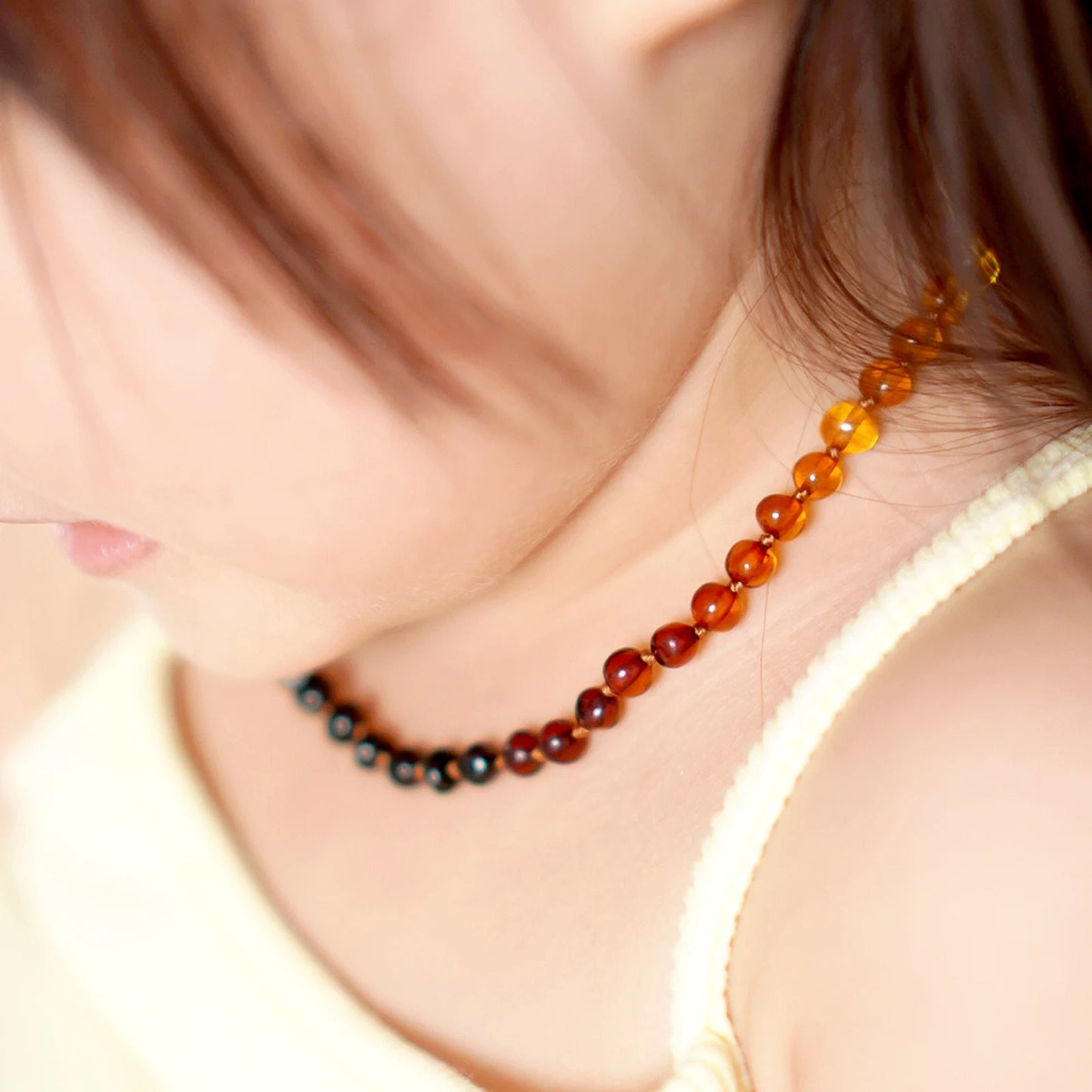 KALUNG AMBER BAYI RAINBOW GLOSSY 32CM. 5X4MM