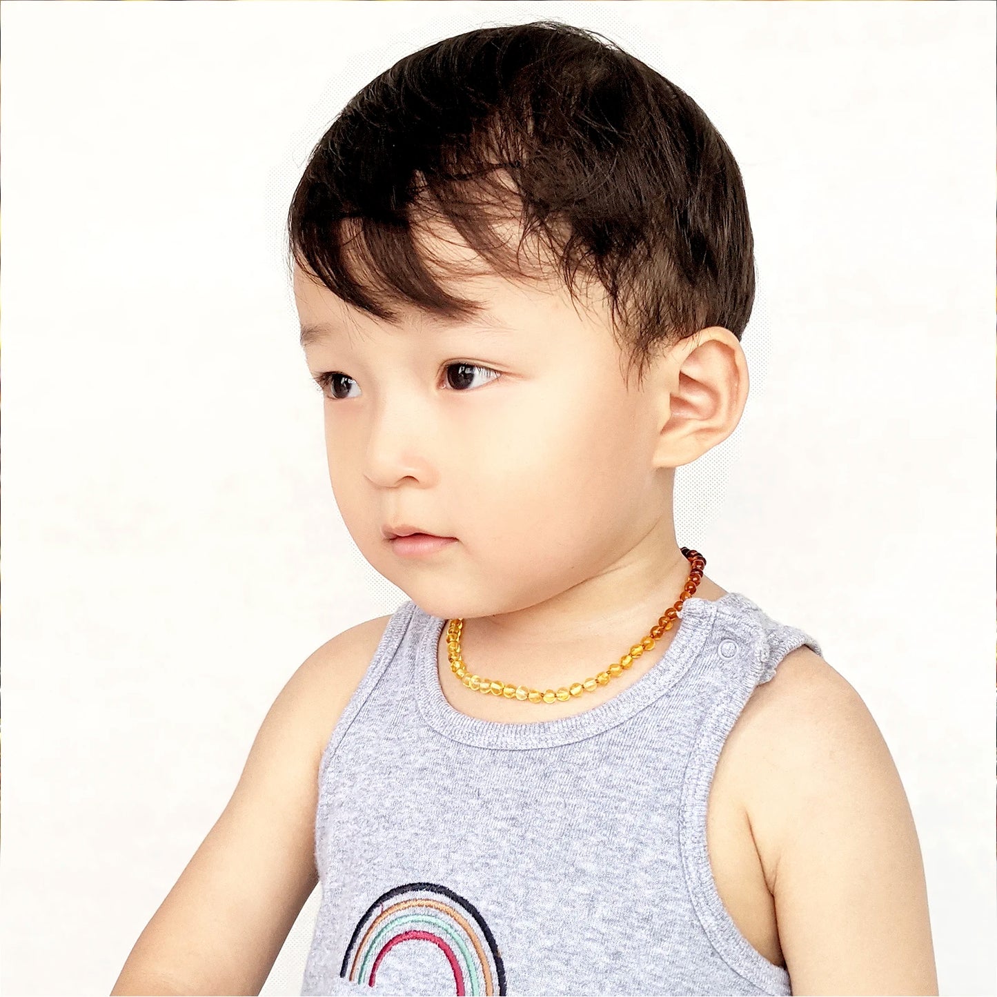 KALUNG AMBER BAYI RAINBOW GLOSSY 32CM. 5X4MM