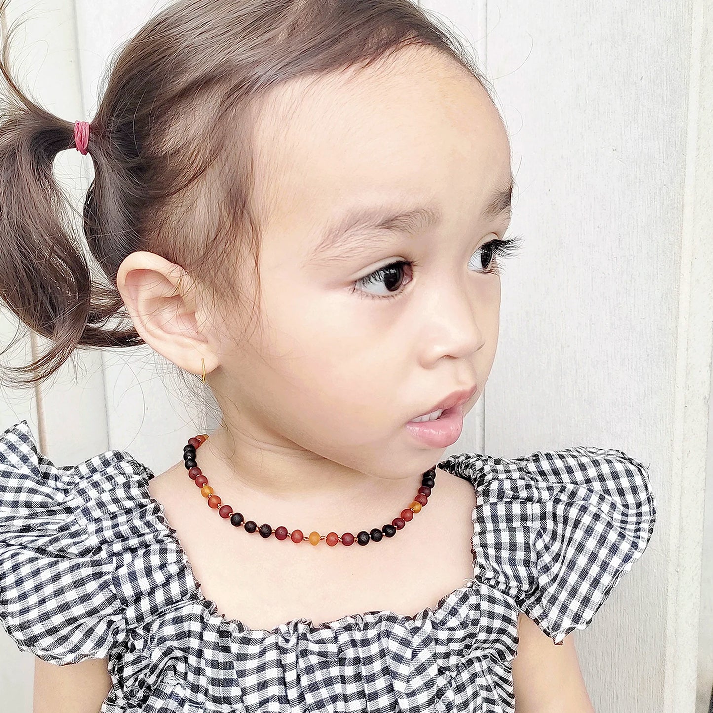 KALUNG AMBER BAYI RAINBOW BROWN MATTE 32CM. 5X5MM