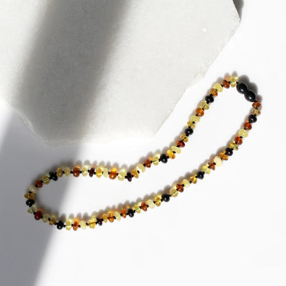KALUNG AMBER UNTUK BAYI TUMBUH GIGI XR63M2