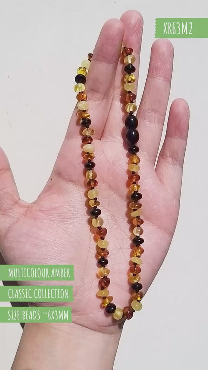 KALUNG AMBER UNTUK BAYI TUMBUH GIGI XR63M2